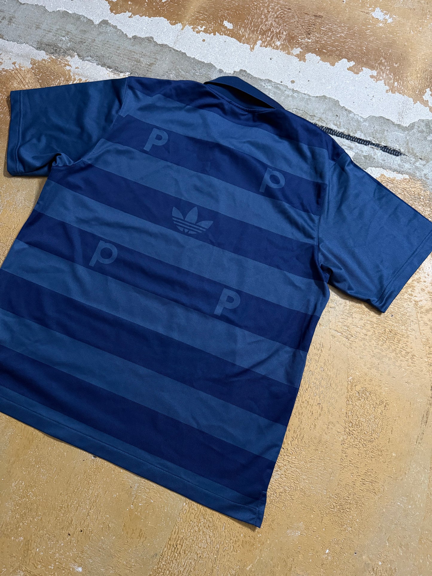 Adidas x Pop trading company polo shirt - L