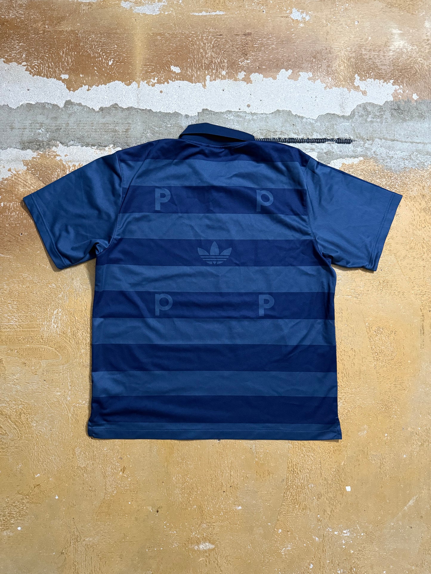 Adidas x Pop trading company polo shirt - L