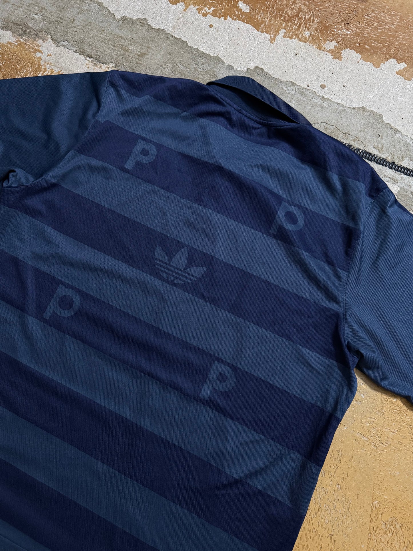 Adidas x Pop trading company polo shirt - L
