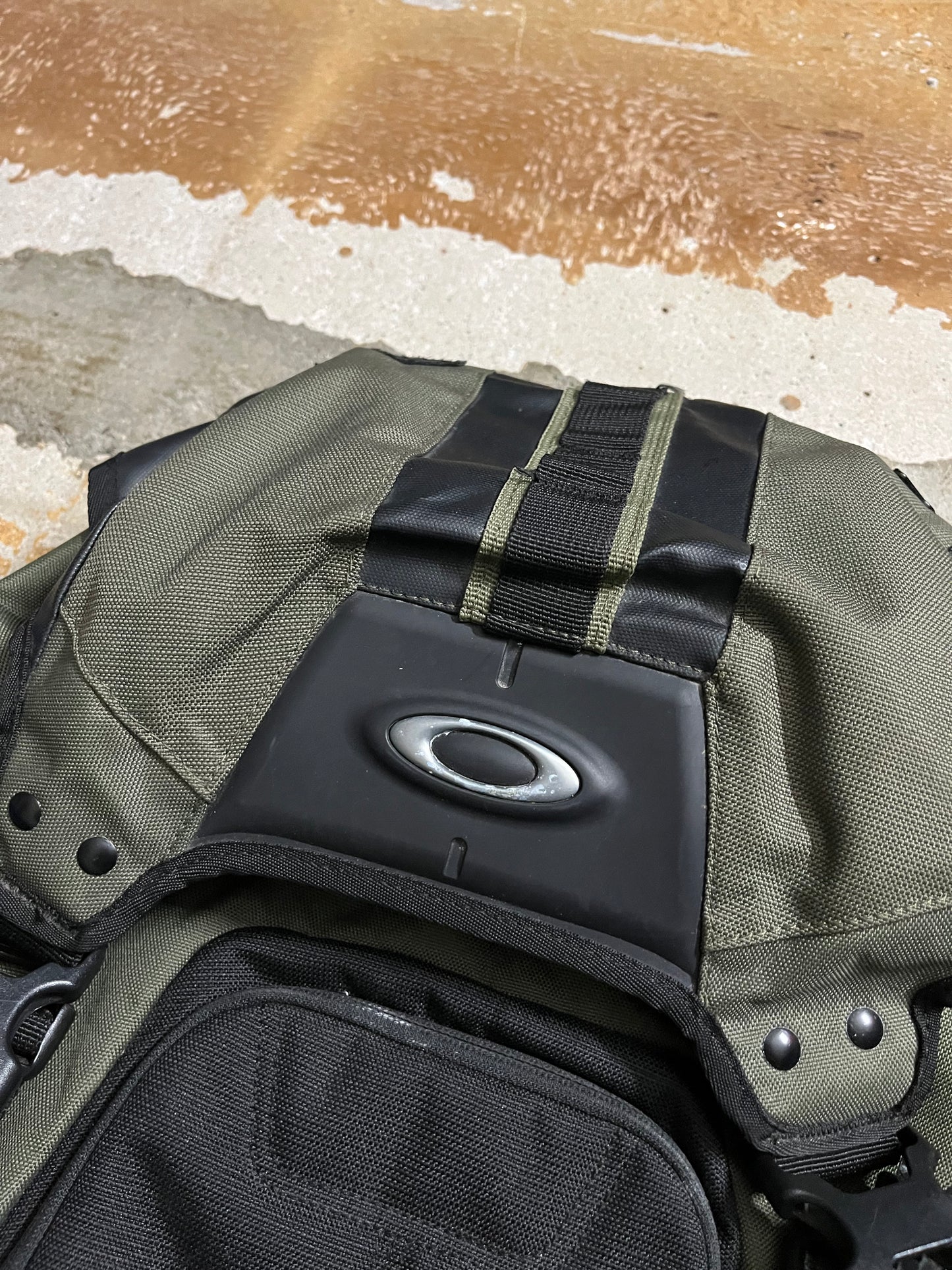 Oakley vintage black / green backpack bag
