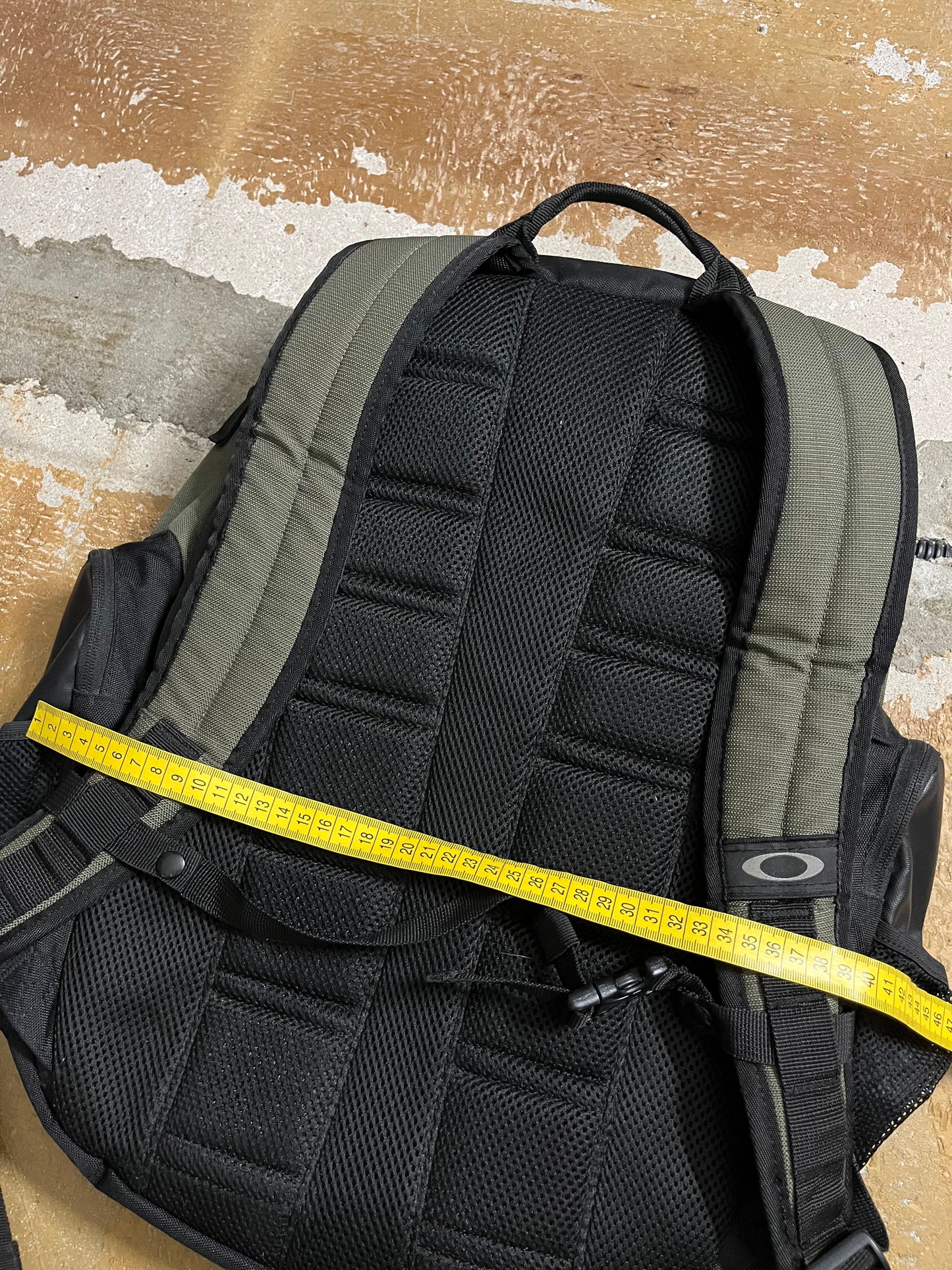 Oakley vintage black / green backpack bag