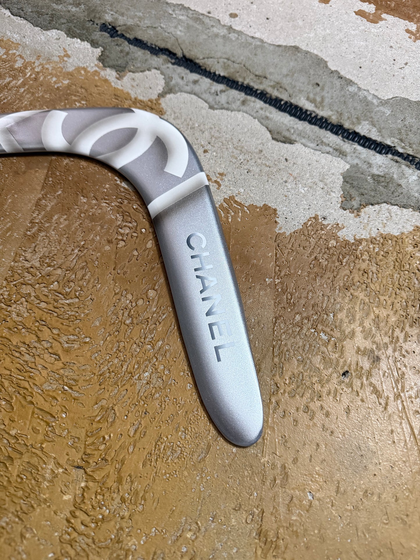 Chanel silver grey printed sports decor boomerang