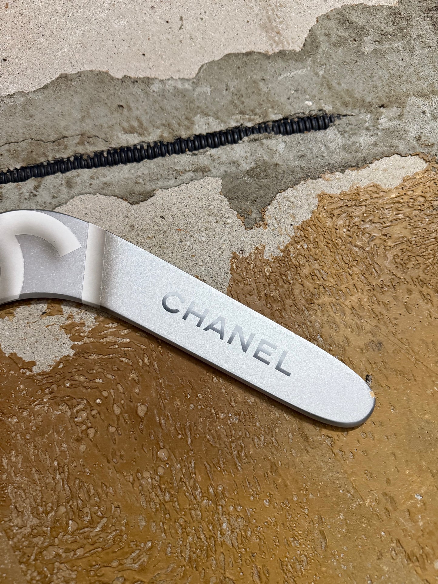 Chanel silver grey printed sports decor boomerang