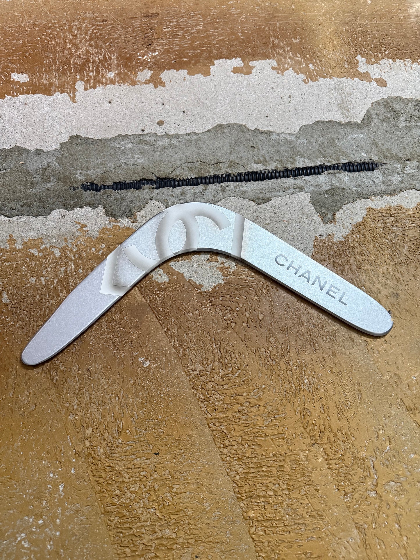Chanel silver grey printed sports decor boomerang