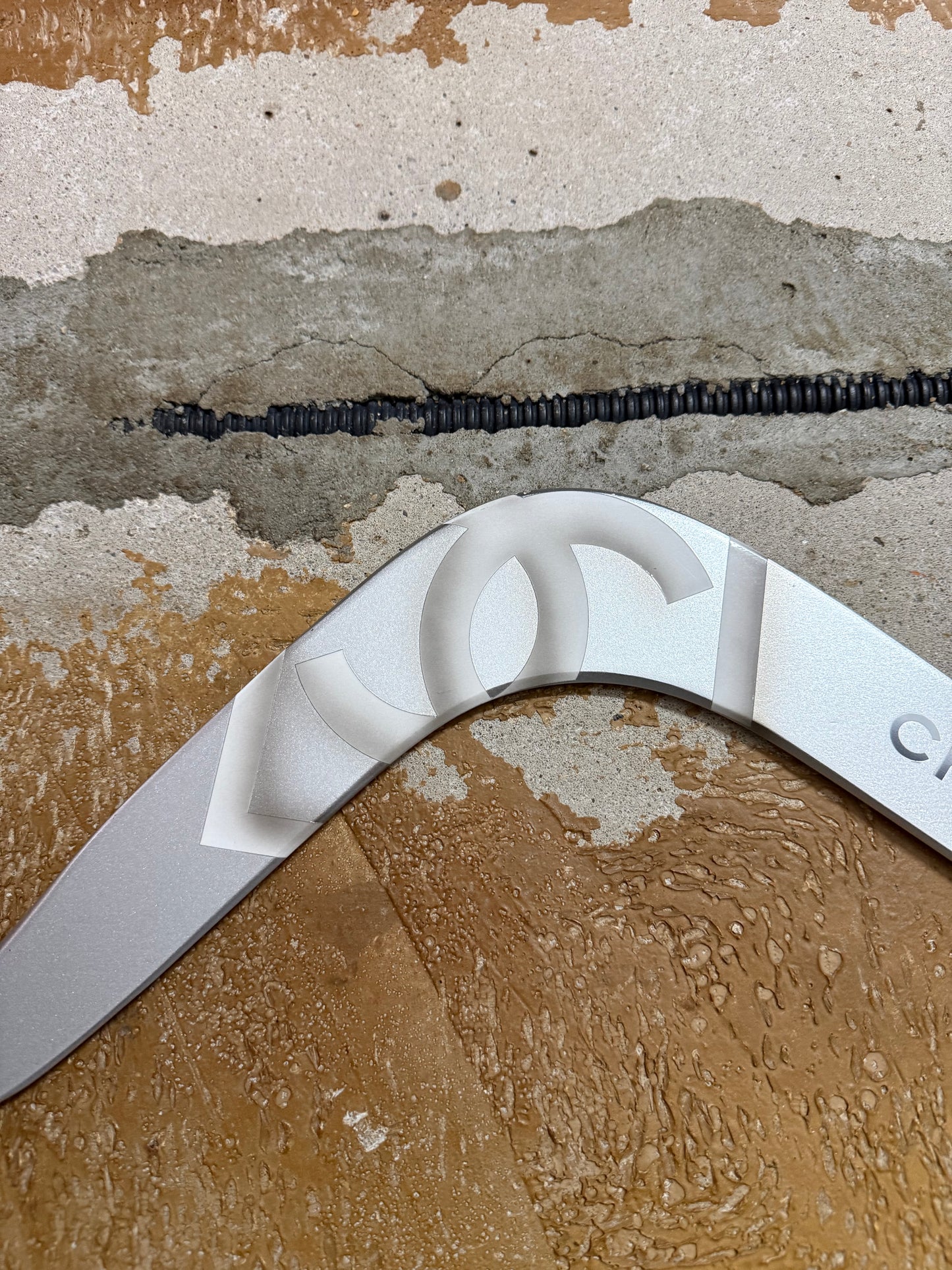Chanel silver grey printed sports decor boomerang