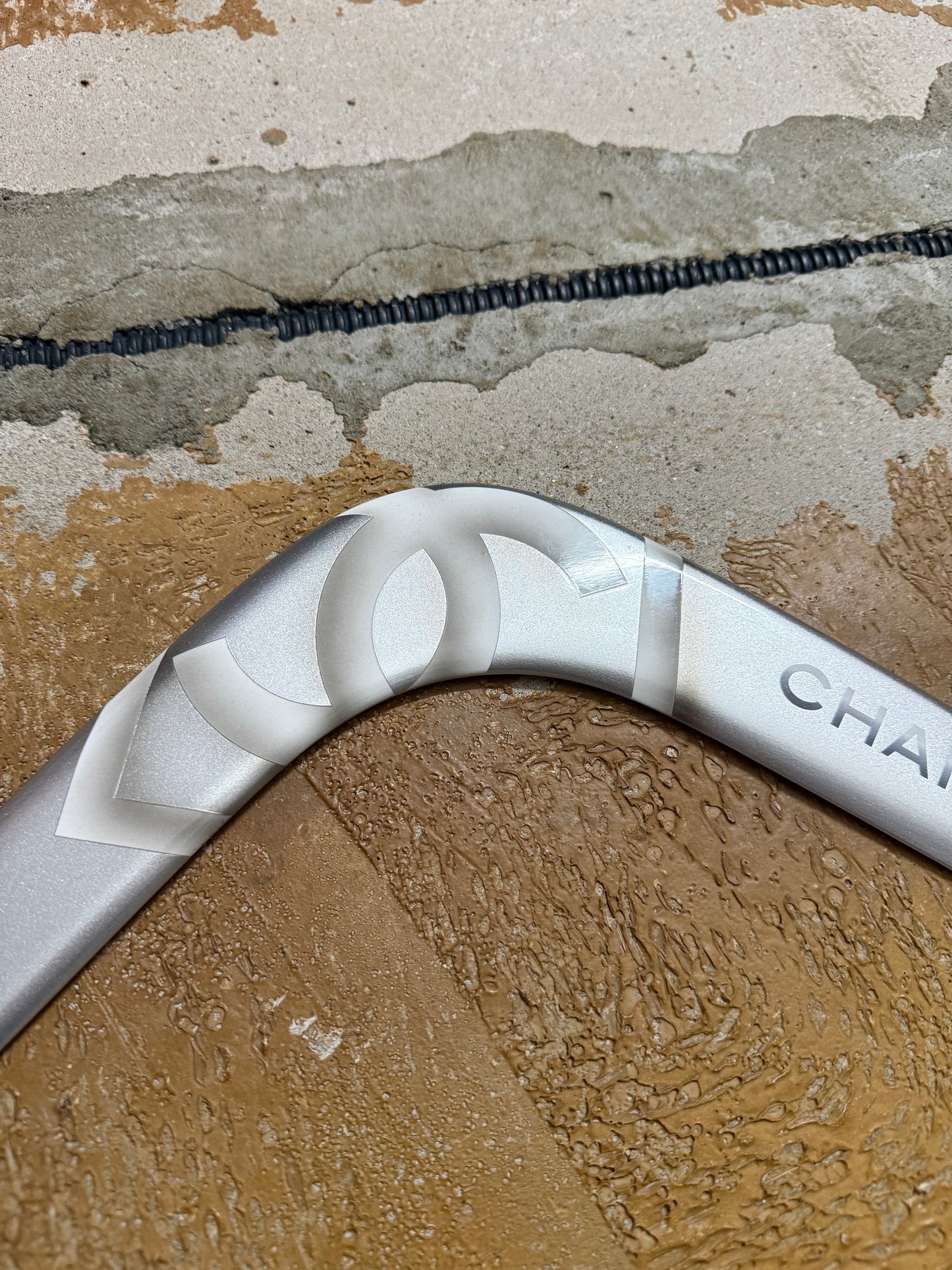 Chanel silver grey printed sports decor boomerang