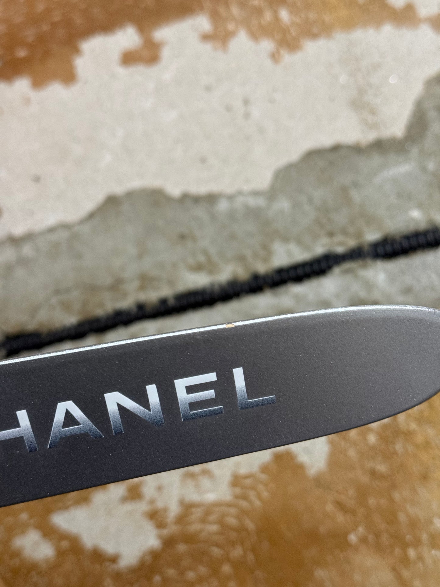 Chanel silver grey printed sports decor boomerang