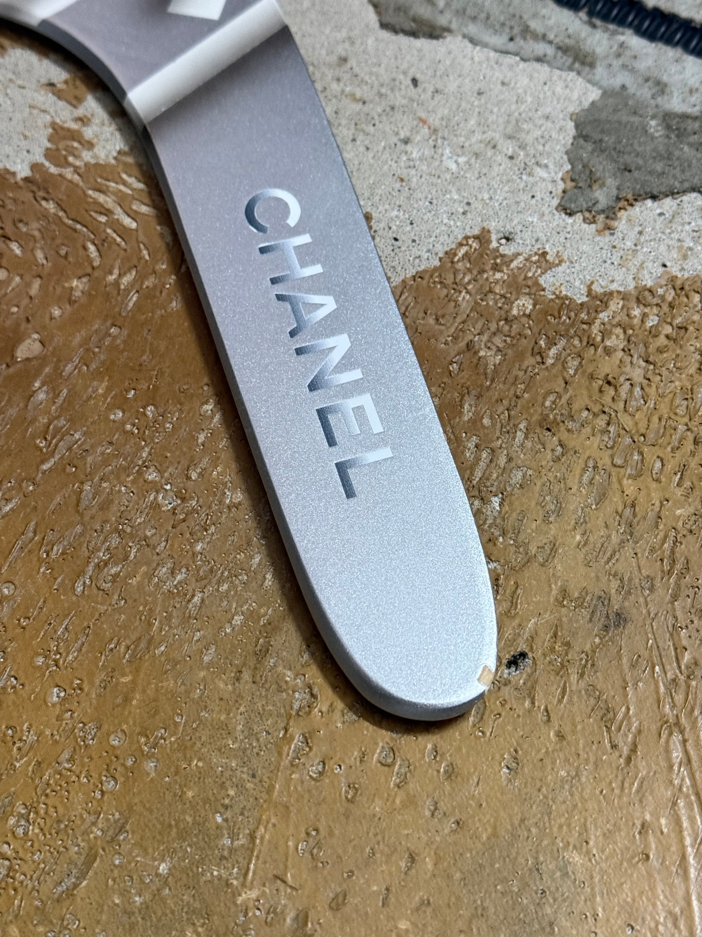 Chanel silver grey printed sports decor boomerang