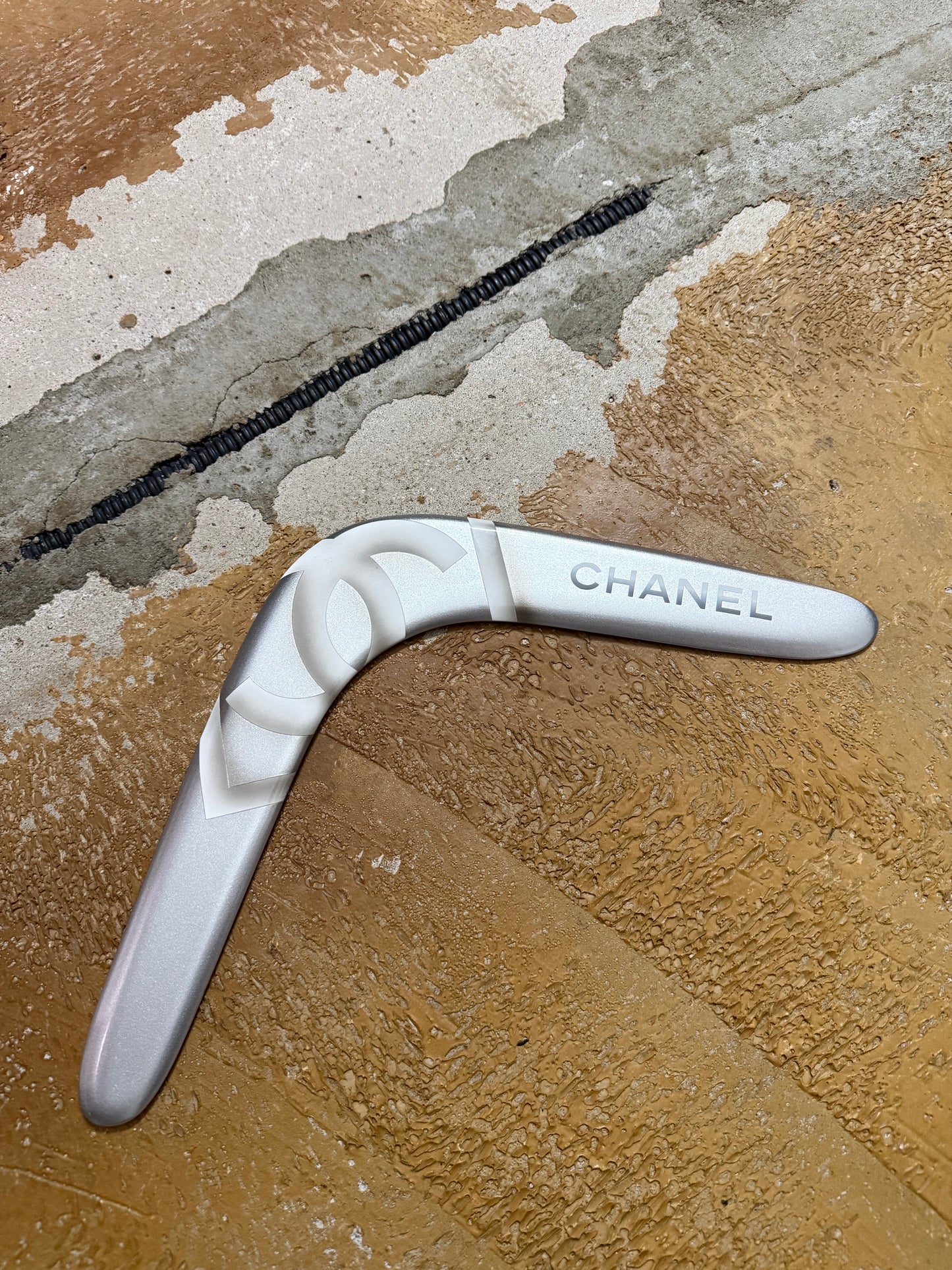 Chanel silver grey printed sports decor boomerang