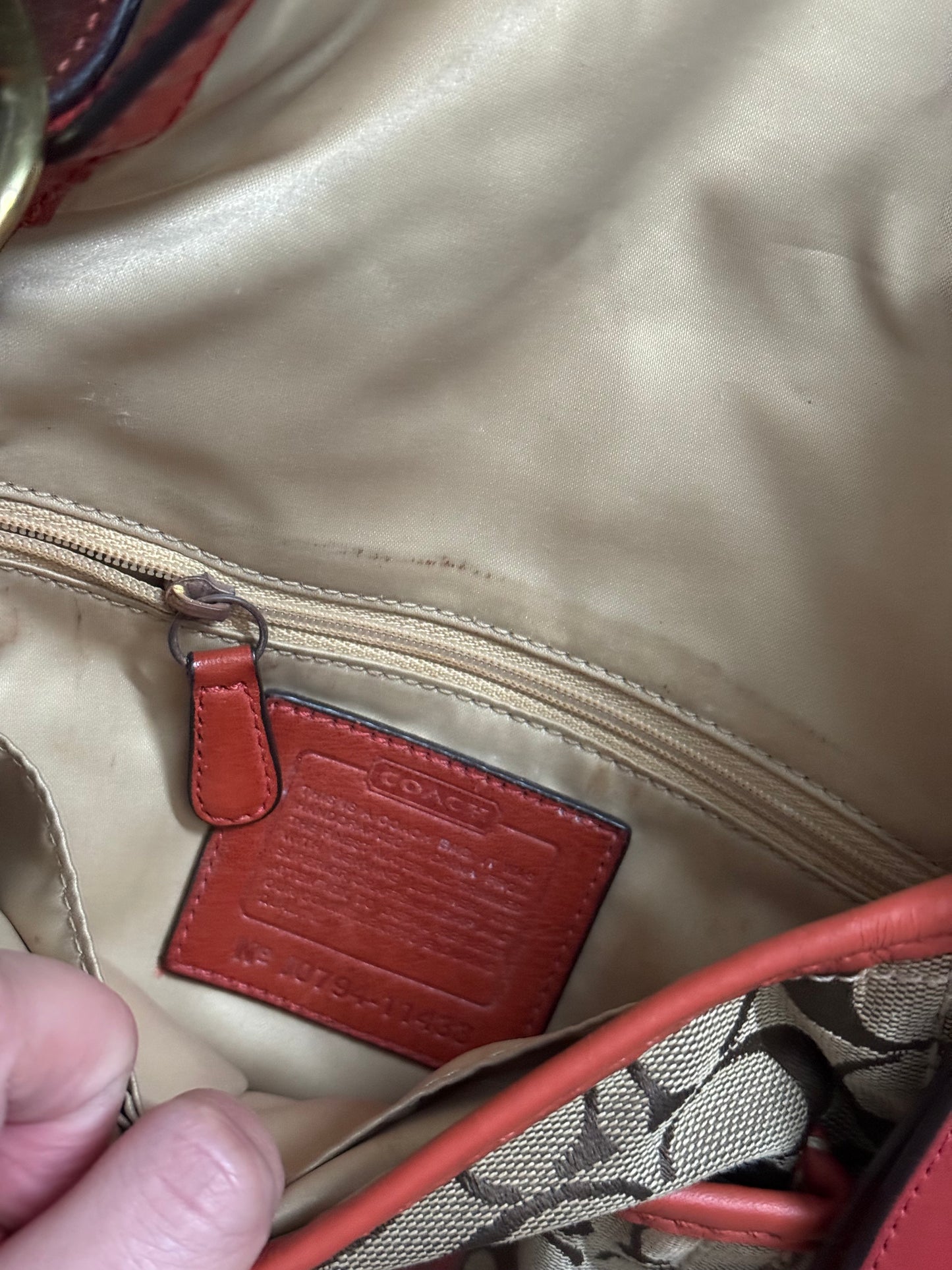 Coach vintage orange monogram bag