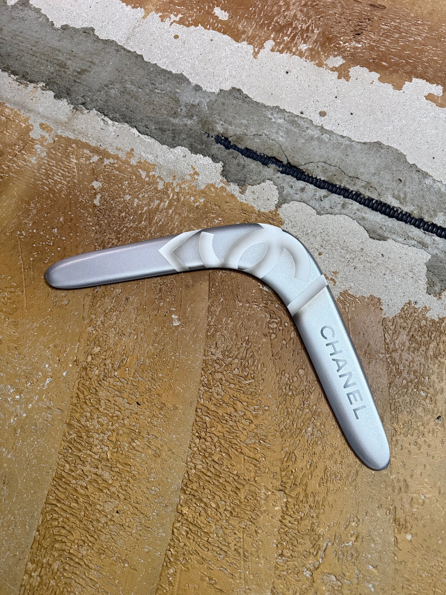Chanel silver grey printed sports decor boomerang