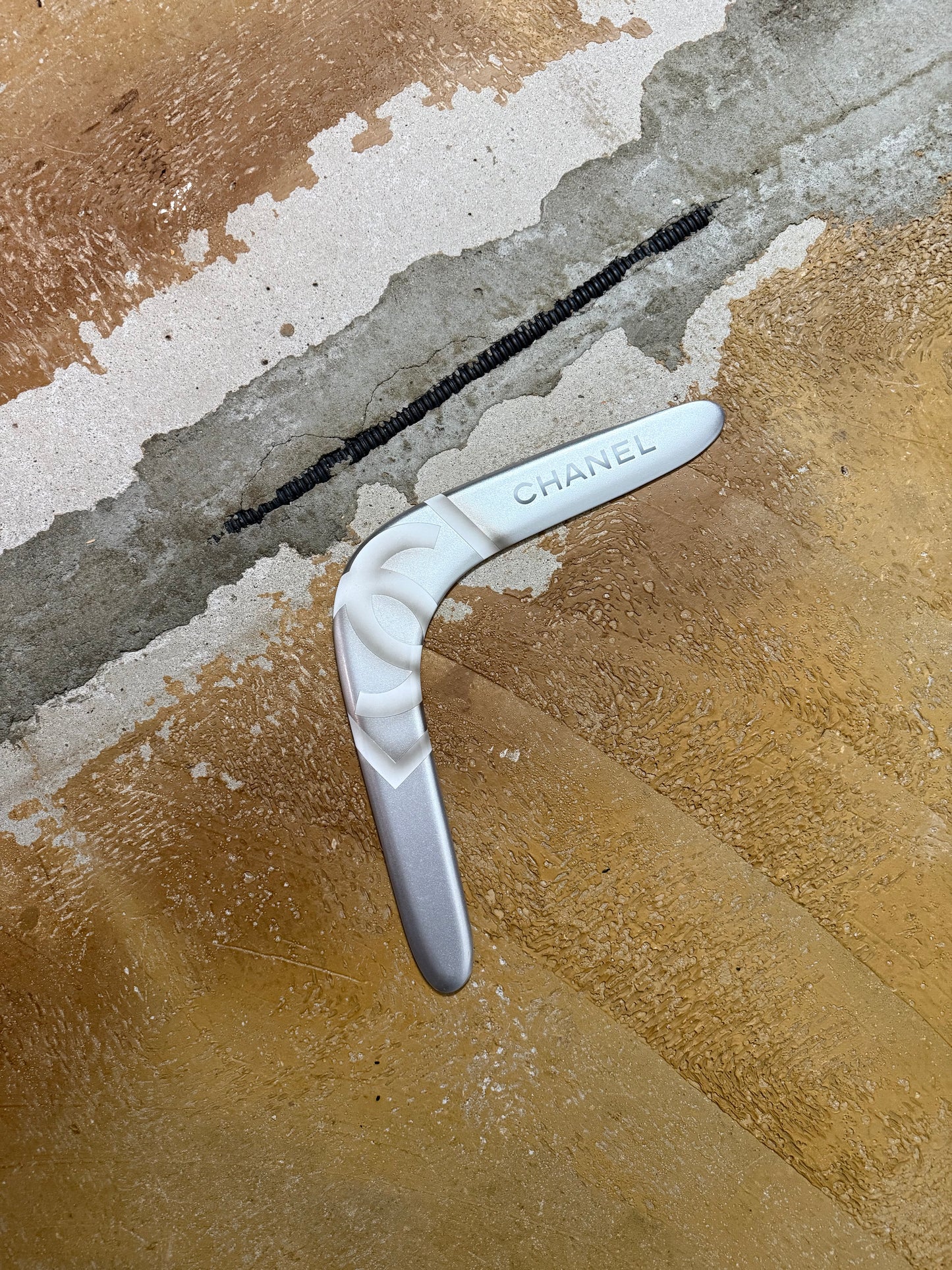 Chanel silver grey printed sports decor boomerang